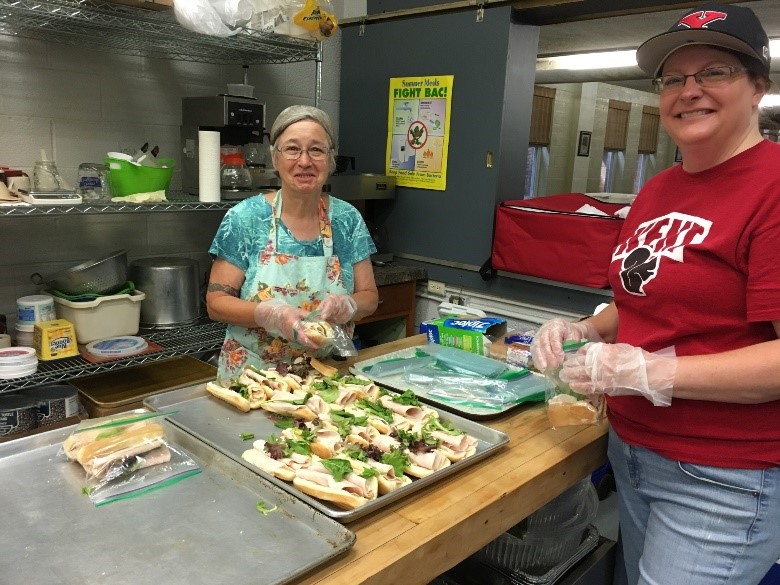 Volunteers Serving Lunches